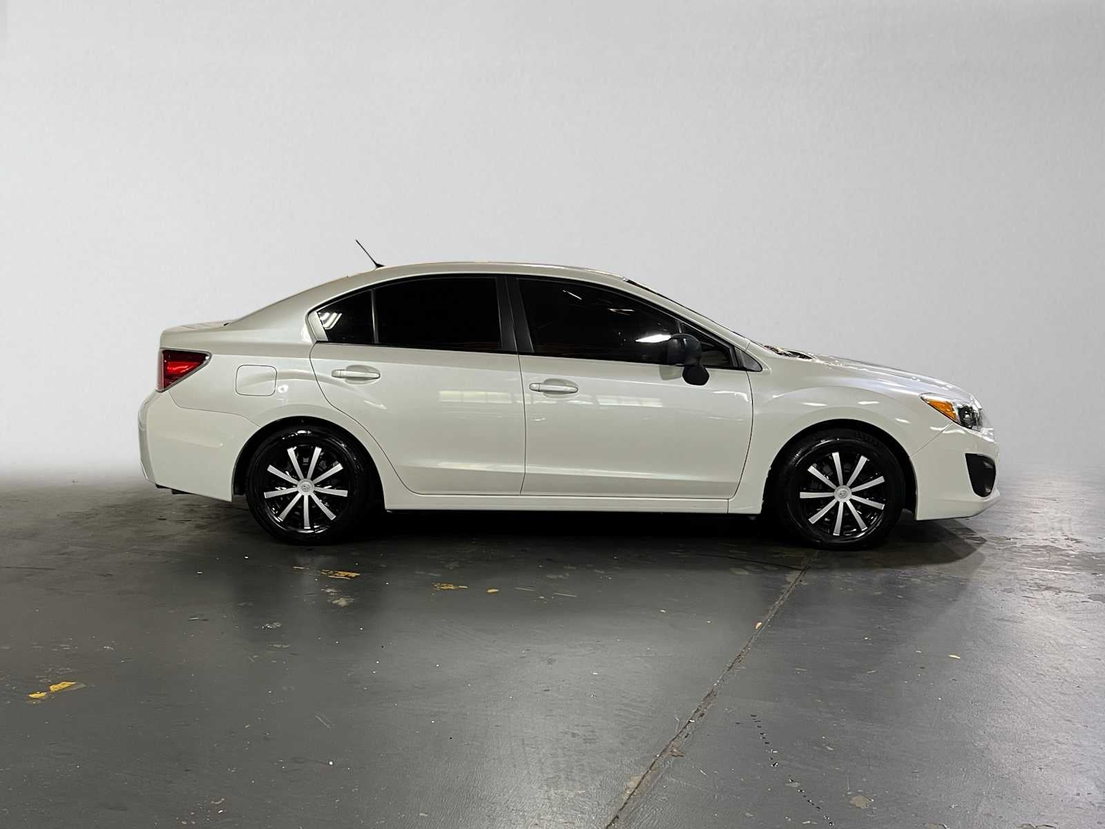 2014 Subaru Impreza 4dr Auto 2.0i