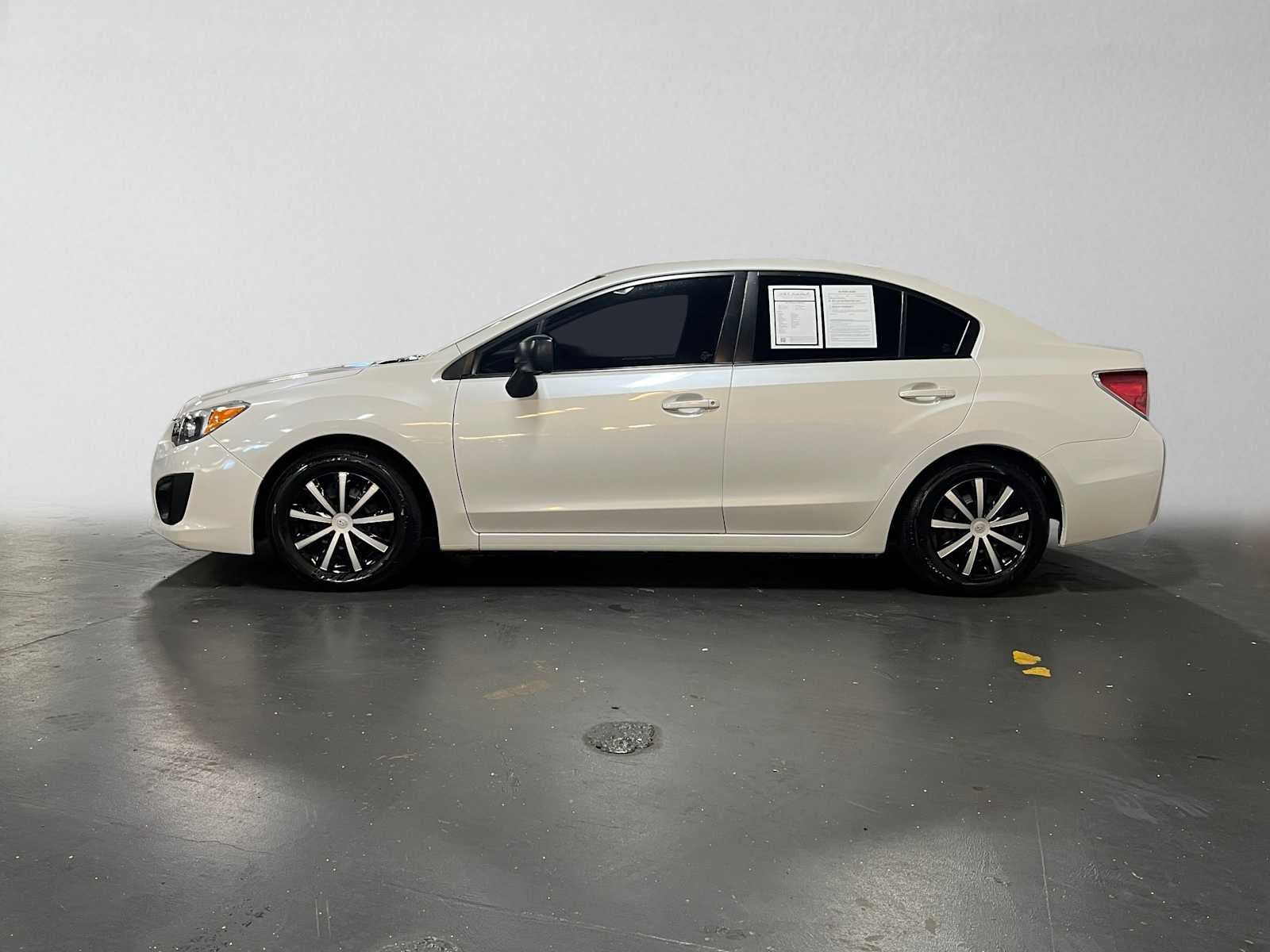 2014 Subaru Impreza 4dr Auto 2.0i